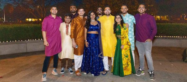 students posing outside on Diwali