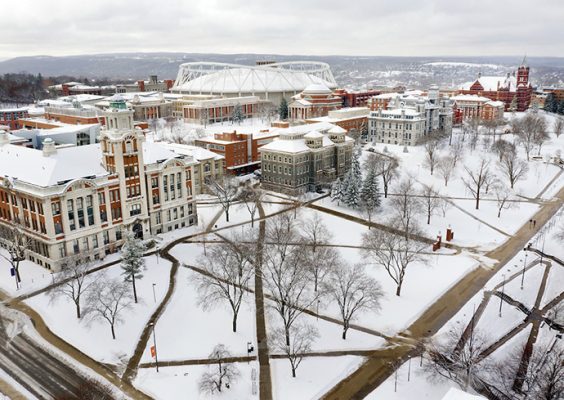 Aerial view of Syracuse University campus coved with fresh snow