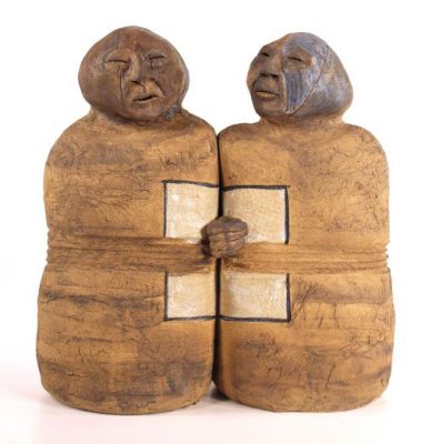 rustic pottery of two people