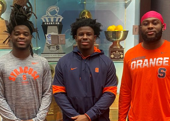 Football student-athletes (from left to right): Ja'Had Carter, Marlowe Wax, and Caleb Okeckukwu.