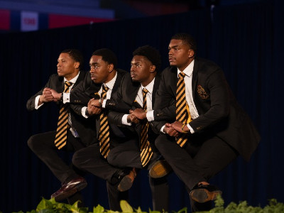 Brothers of Alpha Phi Alpha perform during the MLK program
