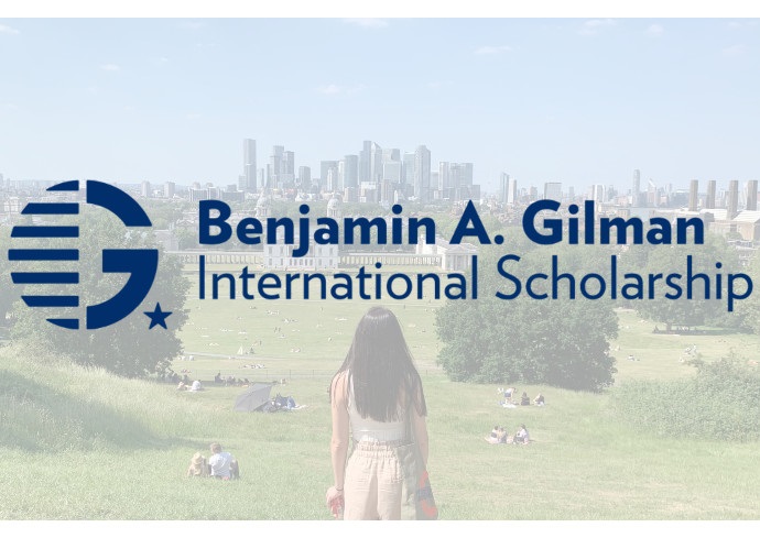 graphic with words Benjamin A. Gilman International Scholarship over a photo of person in field overlooking city