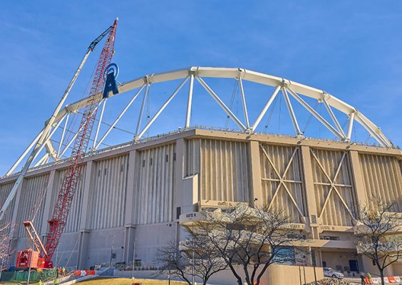 Exterior of JMA Dome with a crane lifting the letter "A" of the JMA Dome sign