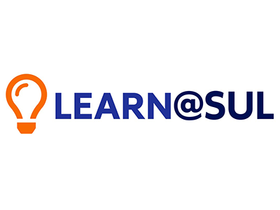 Orange light bulb and Learn at SUL spelled out in blue