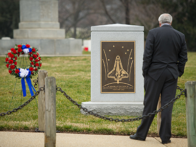 Sean O'Keefe in reflection at the Columbia Memorial at Arlington National Cemetery