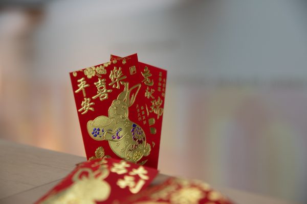 red envelopes embossed with a golden rabbit on display at the School of Architecture Chinese New Year Celebration