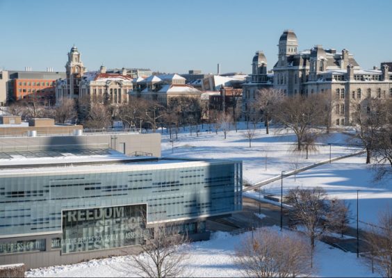 winter scene of several campus buildings