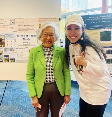 Falk student at Research Honors Fair with Dr. Chen