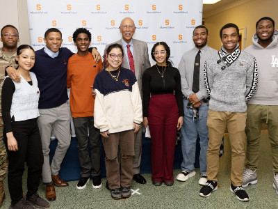 Dave Bing with students at the Maxwell School
