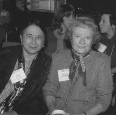 two people sitting together