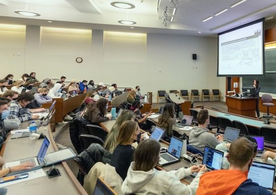 large classroom filled with many students