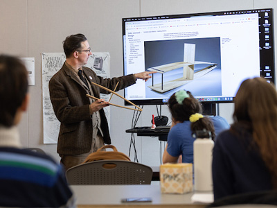 VPA professor Zeke Leonard teaching in a classroom