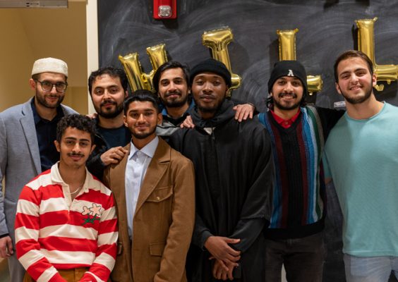 Students gather during a dinner celebrating Ramadan and Passover.