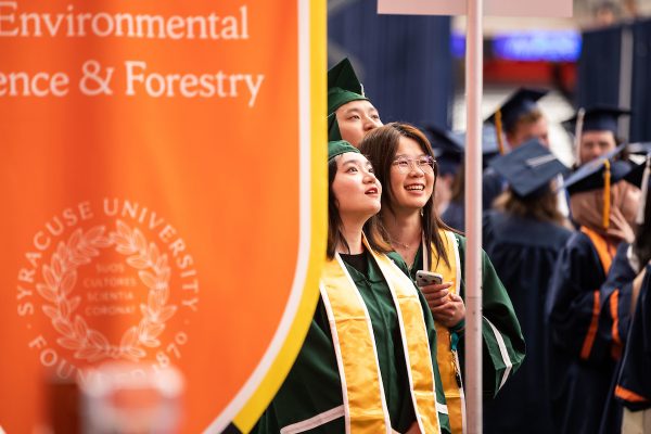 students from SUNY ESF prepare to process at Commencement 2023