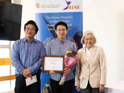 Slepecky Prize winner in center with advisor and Dr. Chen.
