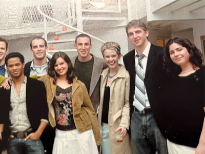 A group of students pose for a photo while participating in the Sorkin Week immersion program.