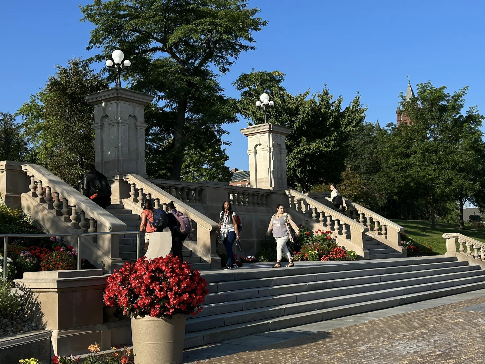Students walking up steps on the Syracuse University campus.