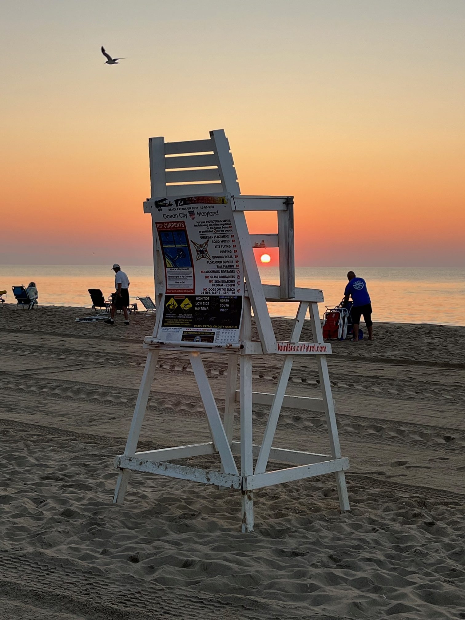 Lifeguard chair on the beach as the sunsets