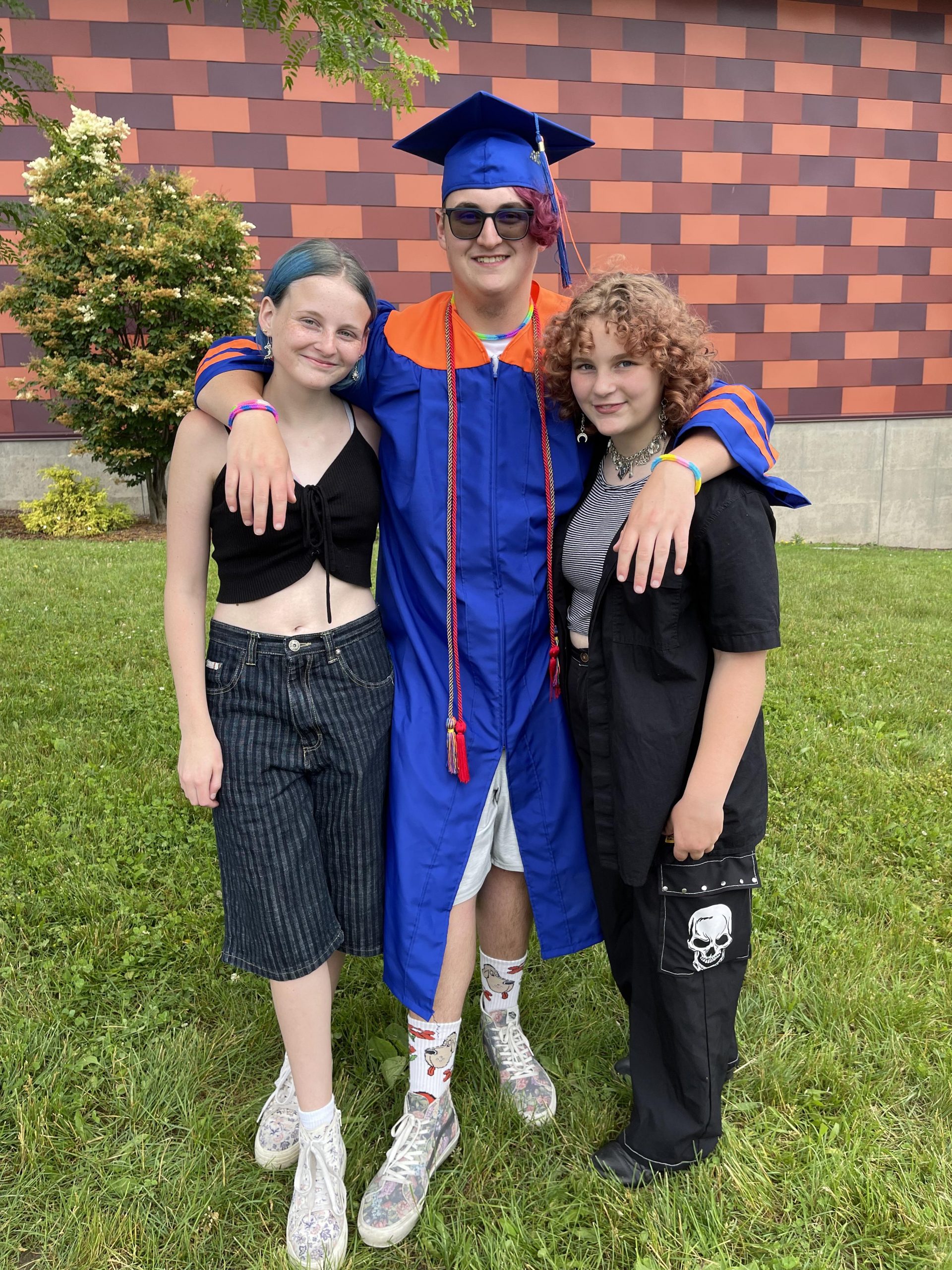 High School graduate with sisters