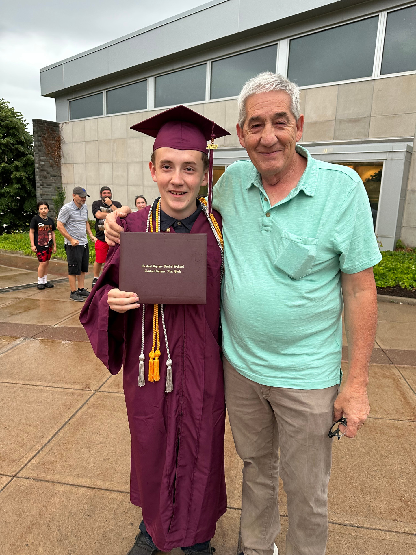 High school graduate and dad