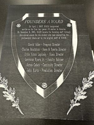 The WAER Founders' Award with the names of faculty advisor Lawrence Myers Jr. and five students—program director Gerald Adler ’48, G’54, news and sports director Charles Reichblum ’48, music director Ehrla Niman Lapinsky ’48, continuity director James Cohan ’48 and production director John Kurtz ’48.