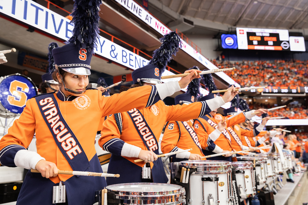 The Syracuse marching band playing during a game in the dome. 