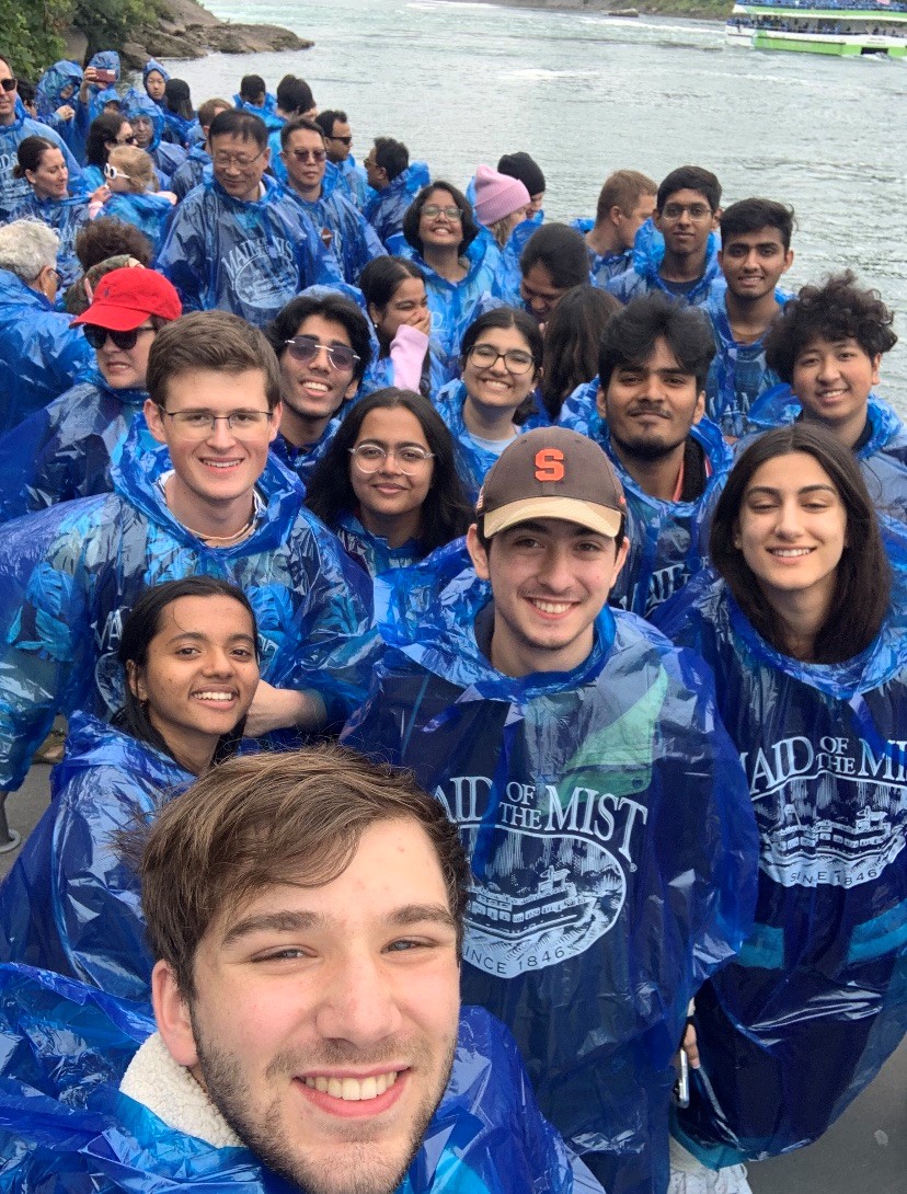 Students wearing blue ponchos at Niagara Falls.
