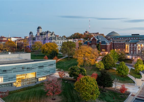An aerial photo of the Syracuse University campus depicting towards Newhouse III, Hall of Languages, Tolley and Maxwell Halls.