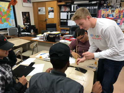 Whitman student working with high school students