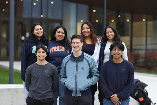 Seven members of the Society of Hispanic Professional Engineers at Syracuse University pose for a group photo. 