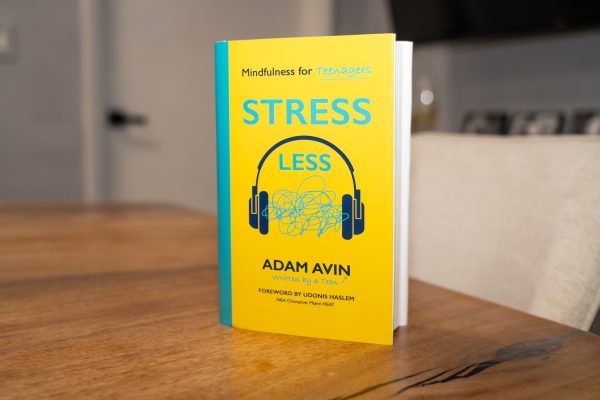 "Stress Less: Mindfulness for Teenagers" book displayed on a table
