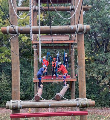 students partake in the ropes course on South Campus