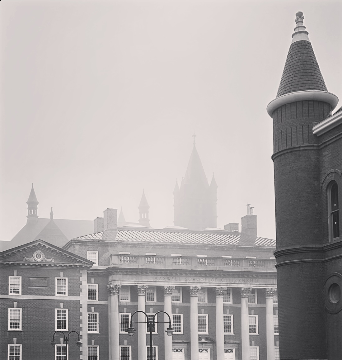 Black and white foggy photo of Maxwell Hall 