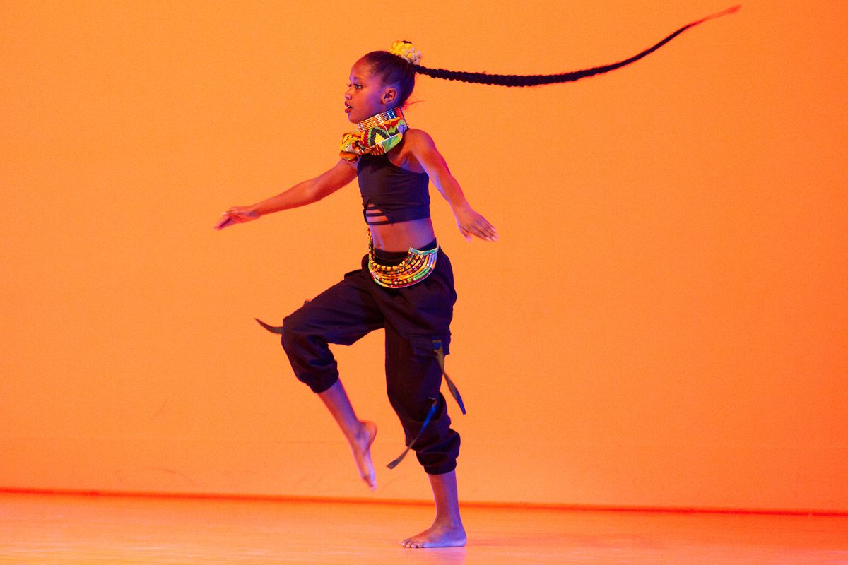A dancer performs on stage,