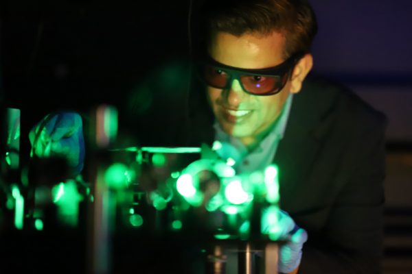 Assistant Professor Pankaj Jha performs a laser alignment in the quantum technology lab
