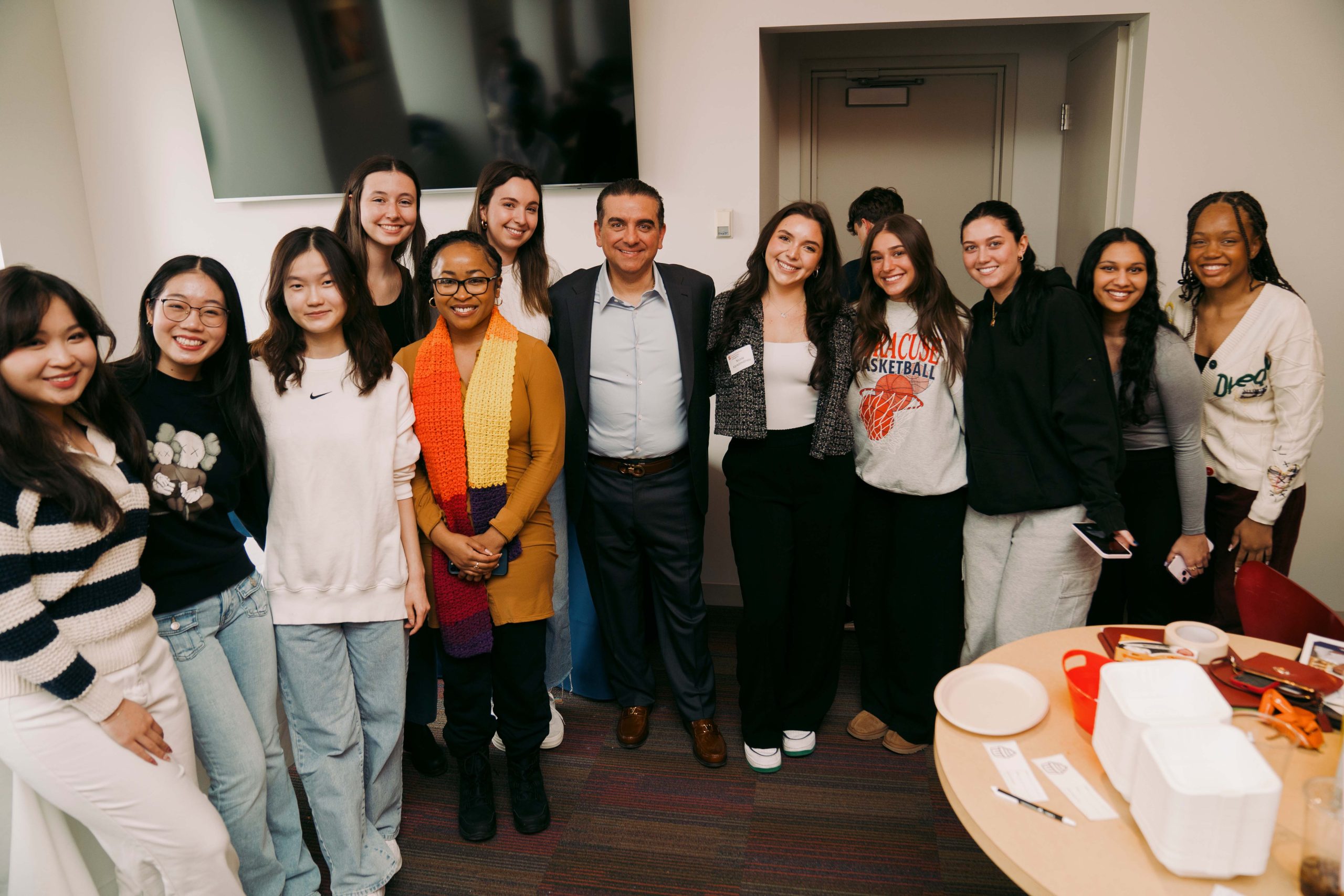 Group of students standing with Celebrity chef and “Cake Boss” Buddy Valastro