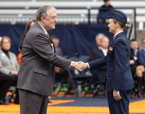 Cadet Emily Weaver '24 receives a scholarship at the Chancellor's Review.