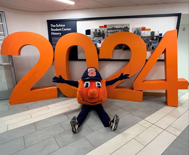 Otto in front of life-size numbers 2024