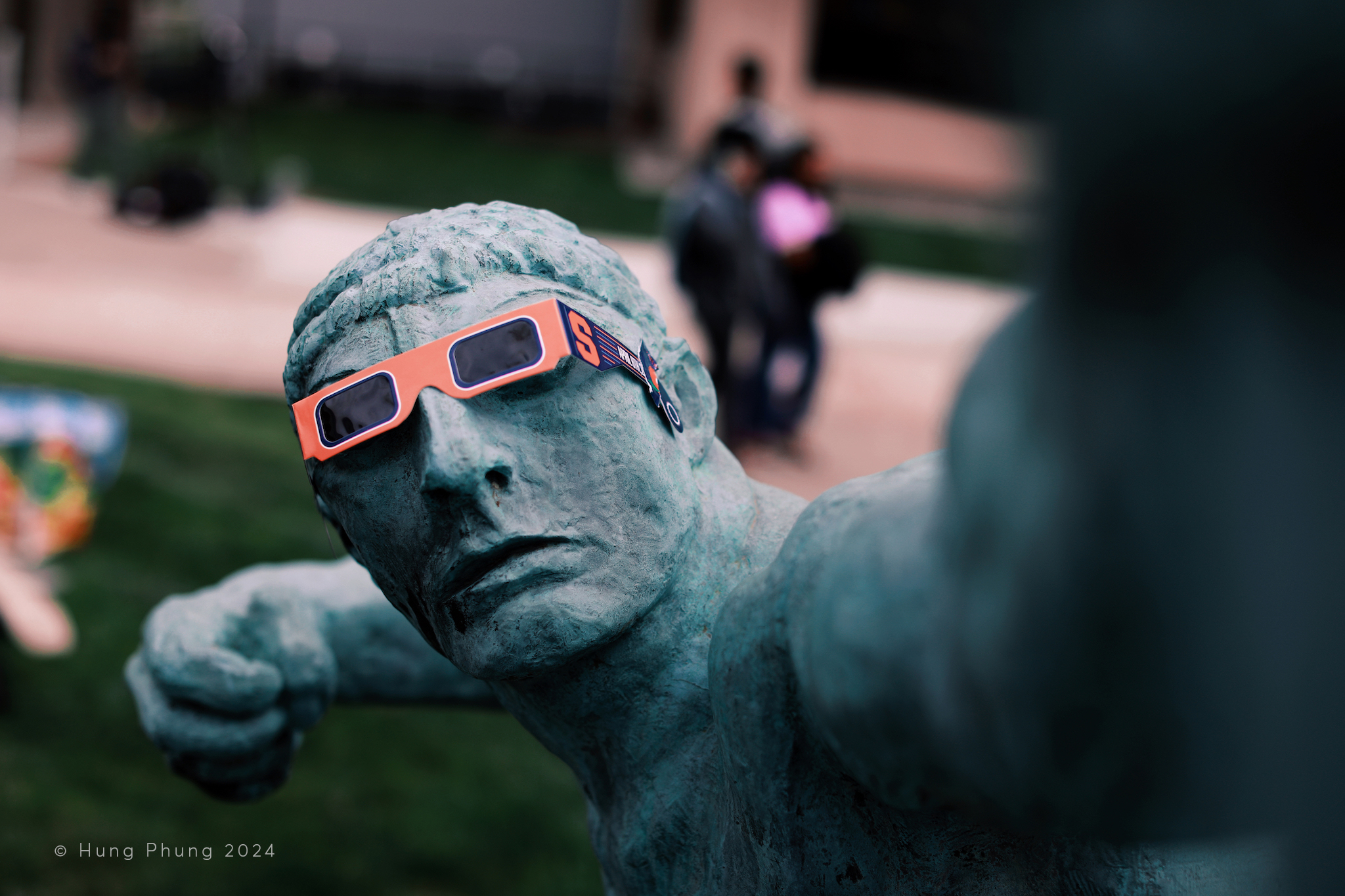 Statue wearing solar eclipse glasses