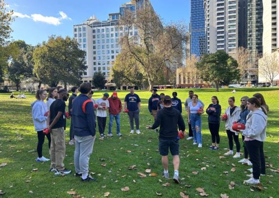 Students learning rugby on trip to Australia in spring of 2024.