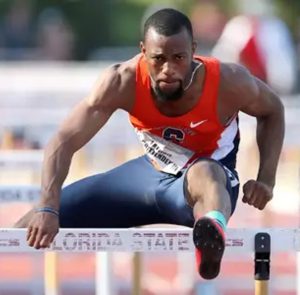 Freddie Crittenden jumps a hurdle in a race