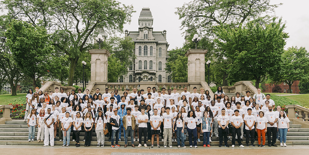 large group of students participating in SummerStart program pose on steps in front of Hall of Languages