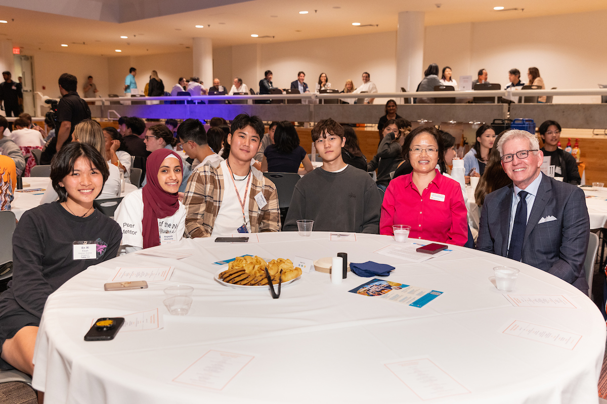 Group of people sitting at a table in the rail