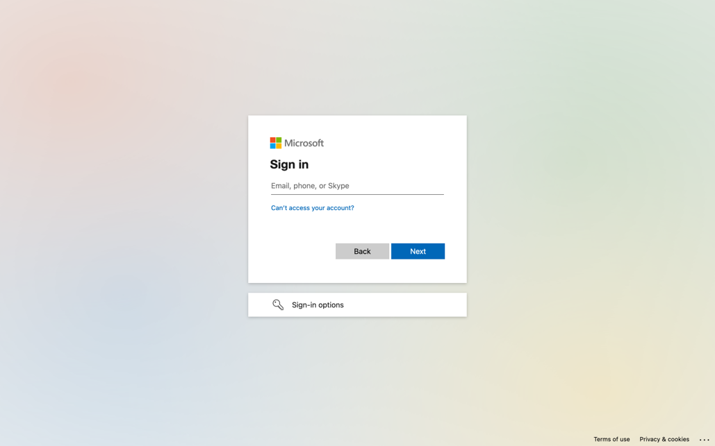 screenshot of current Microsoft Sign in screen, which includes a muted pastel color backdrop, the Microsoft logo and a place to enter your email address, with the words "Sign in" and a blue button that says "Next"