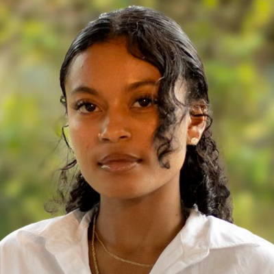 A woman poses for a headshot.