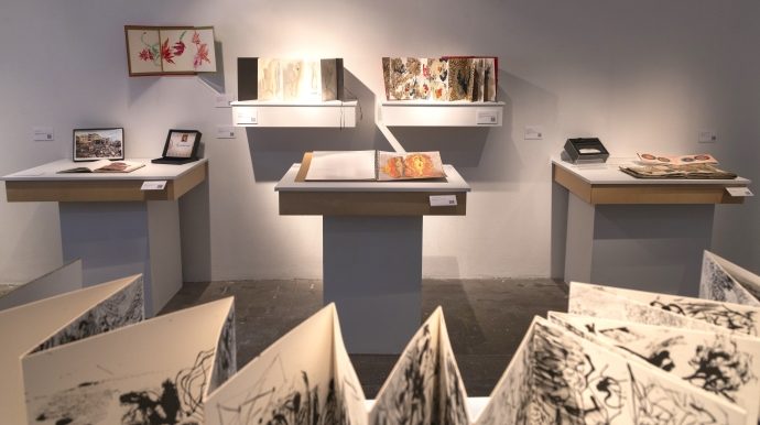 exhibit of artists books of varying sizes, types and colorations