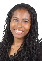 smiling woman with braided dark hair