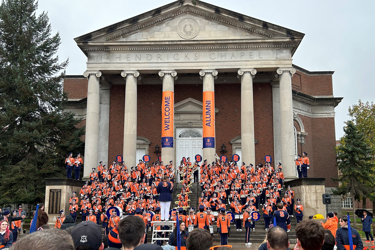 The Syracuse University Marching Band performs on the steps of Hendricks Chapel during Orange Central weekend.