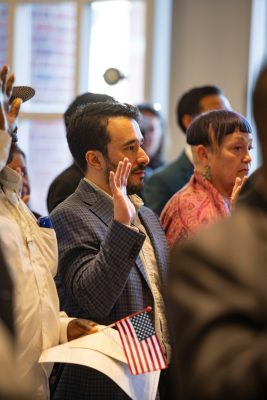 Professor Tomas Olivier takes the naturalization oath