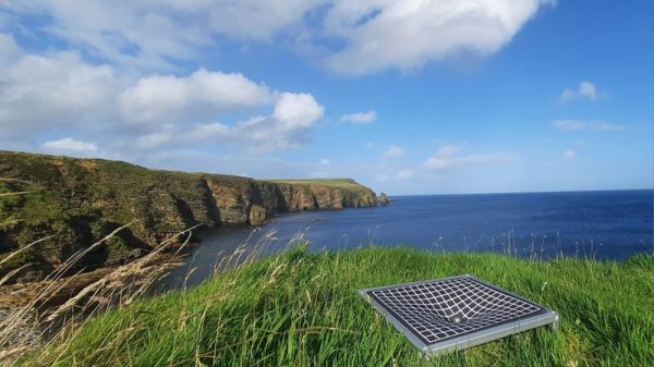 The team brought their rubber spacetime demonstrator to the cliffs of Orkney to capture a scenic photo during the festival.